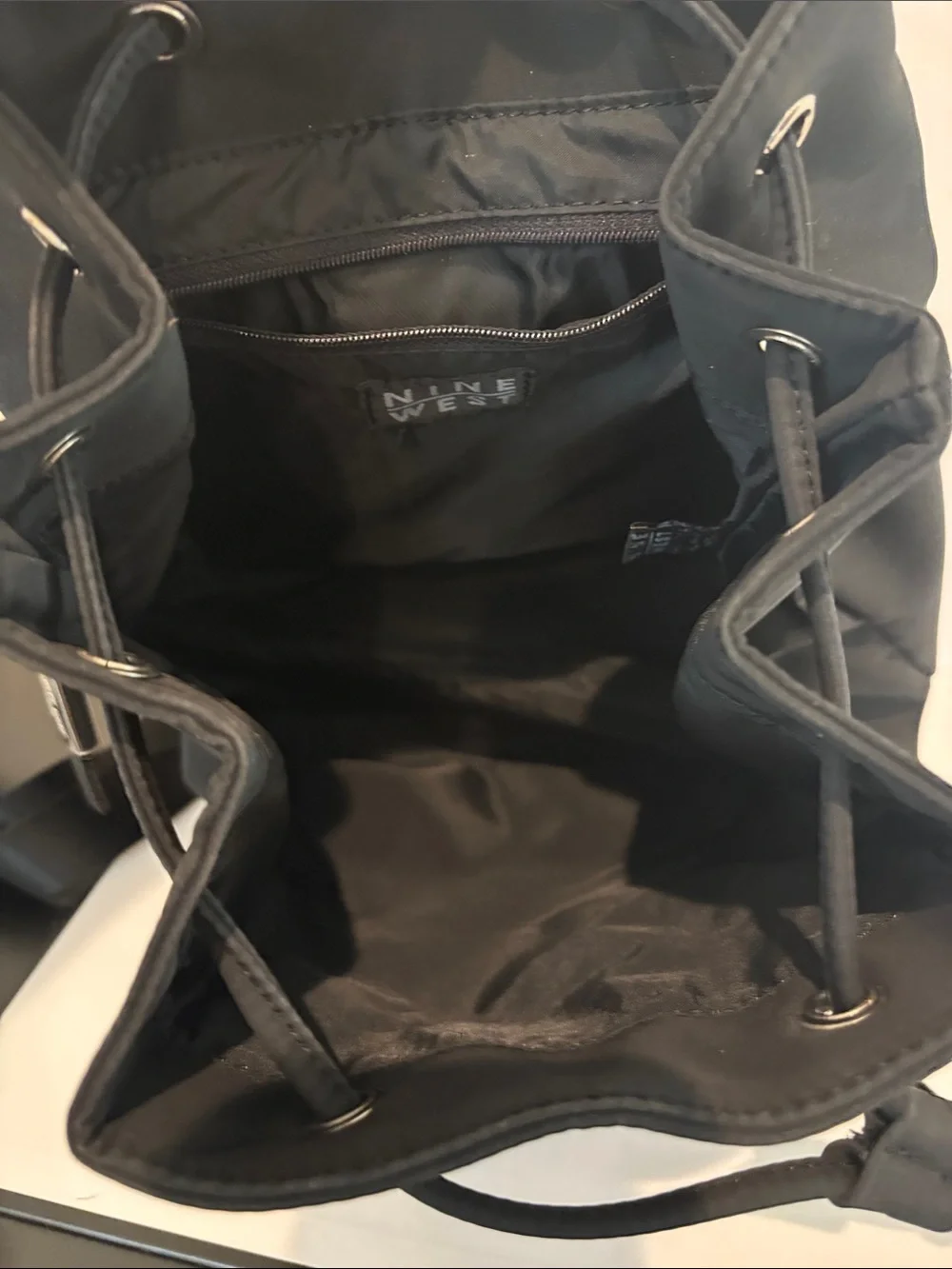 Nine West Black Drawstring Flap Backpack